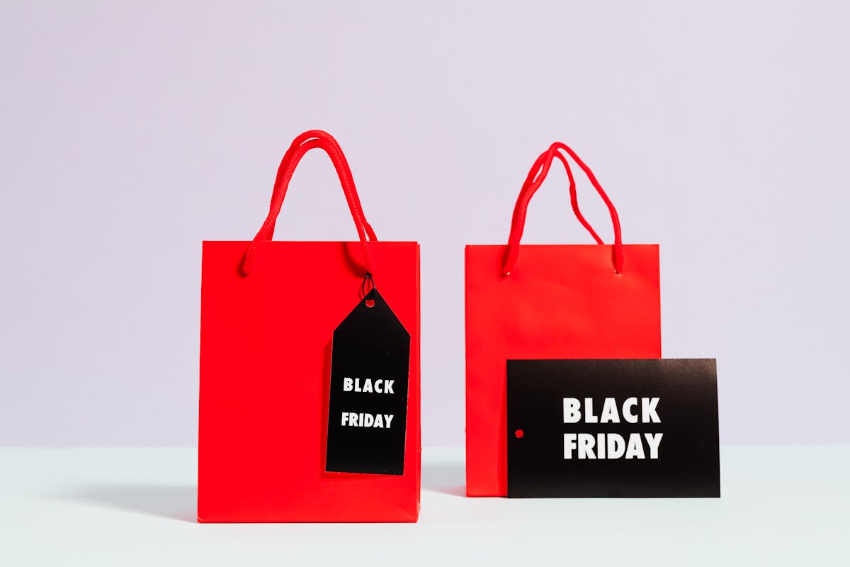 Black Friday sale shopping bags with discount tags