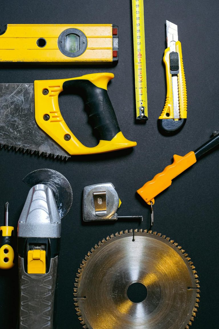 Collection of yellow and black power tools combo kit