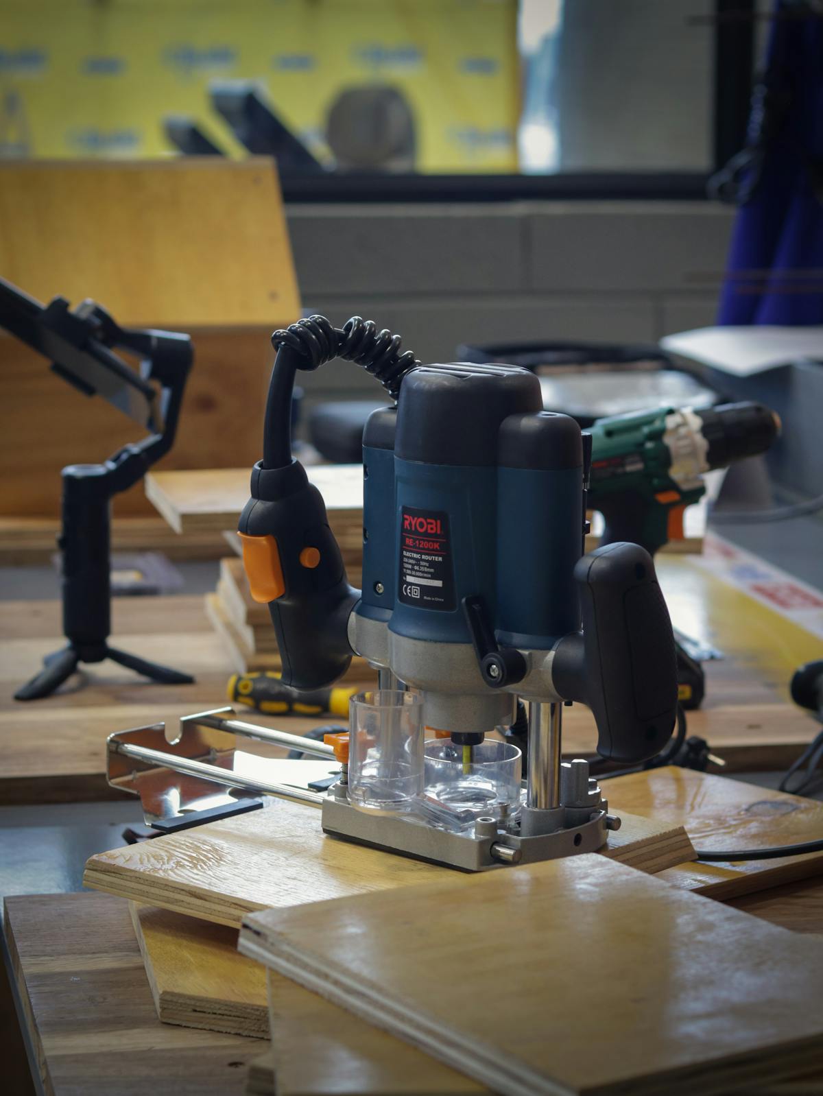 Milling machine on workbench in woodworking workshop